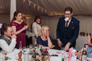 Image of man performing magic trick